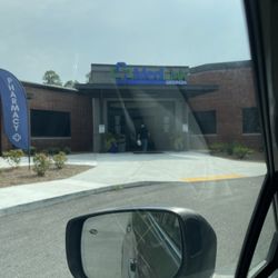 Entrance is in the rear of the building.