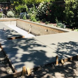 Just poured concrete surround on new pool by MC Construction. Just poured concrete surround on new pool by MC Construction.