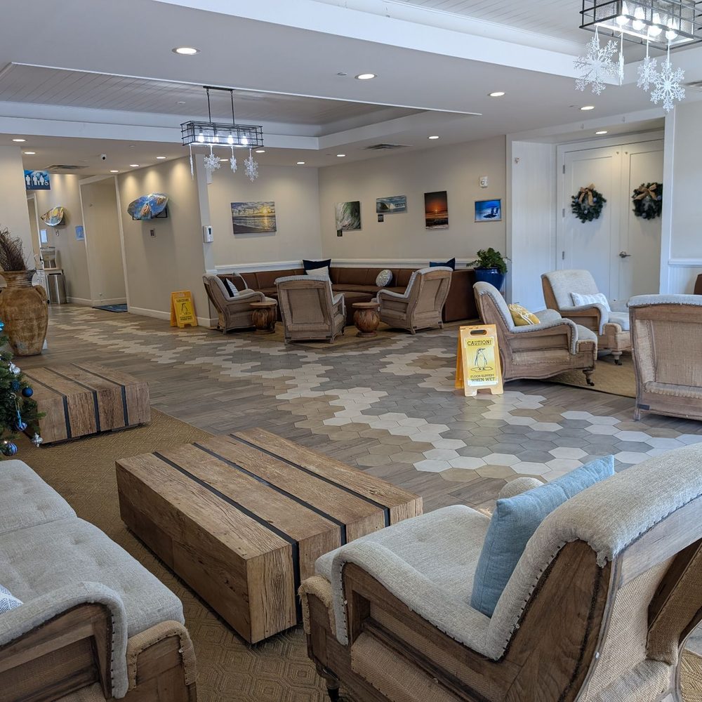 Guy Harvey Resort St Augustine Beach - Seating area behind reception - Resorts Near Me - Saint Augustine Beach, Florida Guy Harvey Resort St Augustine Beach - Seating area behind reception - Resorts Near Me - Saint Augustine Beach, Florida