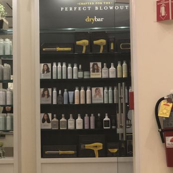 Drybar - Alpharetta - Product wall near front entrance - Blow Dry/Out Services Near Me - Alpharetta, Georgia Drybar - Alpharetta - Product wall near front entrance - Blow Dry/Out Services Near Me - Alpharetta, Georgia
