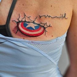 New Addiction Tattoo - Captain America sheild on back by Joey Darko