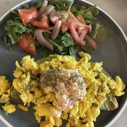Avocado Smash Toast (scrambled eggs) above my eggs is the feta cheese.