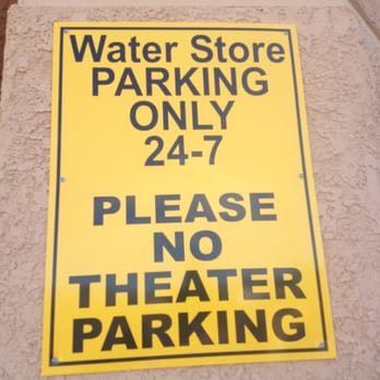 The Water Station - a yellow and black sign - Water Stores Near Me - Henderson, Nevada The Water Station - a yellow and black sign - Water Stores Near Me - Henderson, Nevada