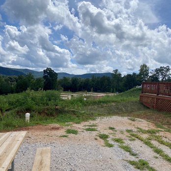 Spacious Skies Campgrounds - Hidden Creek - Overlook site with cabin next door - Campgrounds Near Me - Marion, North Carolina