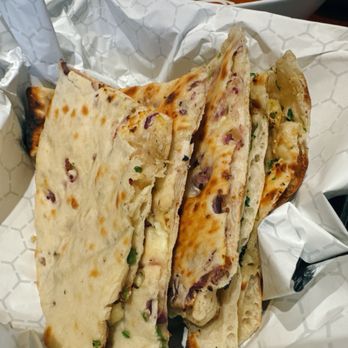 Roti Indian Kitchen - Onion, butter, garlic, cheese naan & garlic naan - Indian Near Me - Grand Rapids, Michigan
