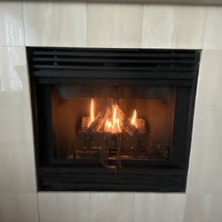 Jasper Inn & Suites - Fireplace in the King Suite - small gas fireplace, on/off switch, nice ambience
