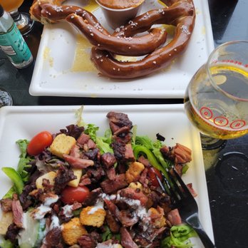 Grand Strand Brewing - Salad with brisket, 50/50 lettuce to meat and giant pretzel - American Near Me - Myrtle Beach, South Carolina