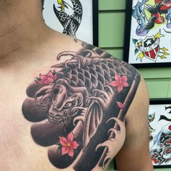Sacred Art Tattoo and Coffee Bar - Sacred Art Tattoo Rocks!!