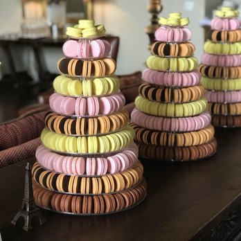 Carousel Macarons - a stack of macarons on a table - Custom Cakes Near Me Carousel Macarons - a stack of macarons on a table - Custom Cakes Near Me