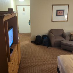 Quality Inn & Suites Greenfield I-70 - Perfect room with a comfy King size bed. A small sitting area, refrigerator, microwave and plenty of room.