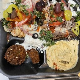 Sampler plate- falafel, humus, beef and chicken schwarma Sampler plate- falafel, humus, beef and chicken schwarma