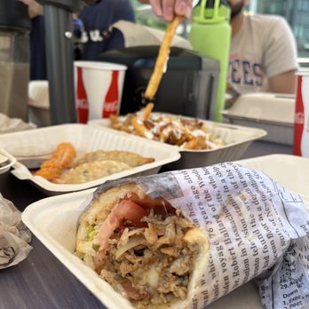 Uptown Cafe - Half of my Chipotle chicken sandwich - Coffee & Tea Near Me - Chantilly , Virginia