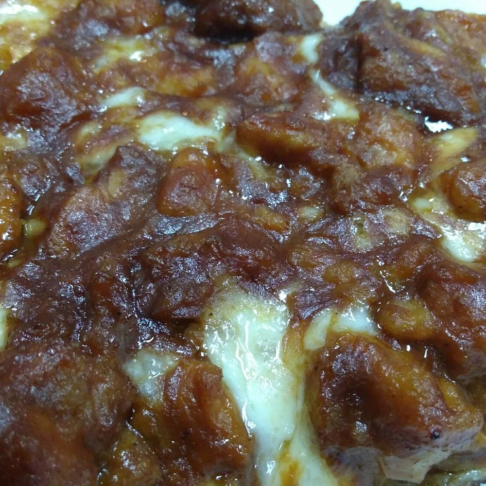 Gigis Pizza - Close up of BBQ chicken slice - Pizza Near Me - New Hyde Park, New York Gigis Pizza - Close up of BBQ chicken slice - Pizza Near Me - New Hyde Park, New York
