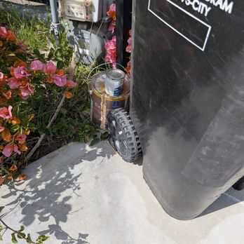 G&S Junk Removal - Photo I took the following day after having to return. They simply hid the paint cans from view and behind the trash cans. - Junk Removal & Hauling Near Me - Pasadena, California