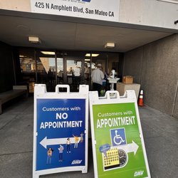 Department of Motor Vehicles - Clear signage. Kiosk in the back right