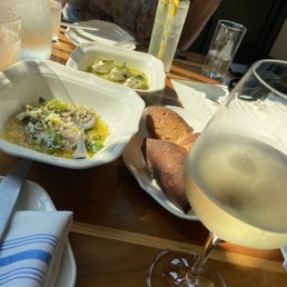 Baguette with olive oil dip and marinated cucumbers