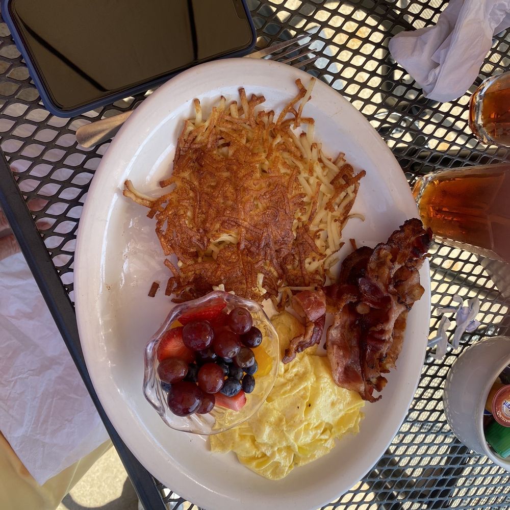 Bishops Diner - Scrambled eggs with hash brown potatoes and bacons. Fruit on the side - Breakfast & Brunch Near Me - O'Fallon, Missouri Bishops Diner - Scrambled eggs with hash brown potatoes and bacons. Fruit on the side - Breakfast & Brunch Near Me - O'Fallon, Missouri