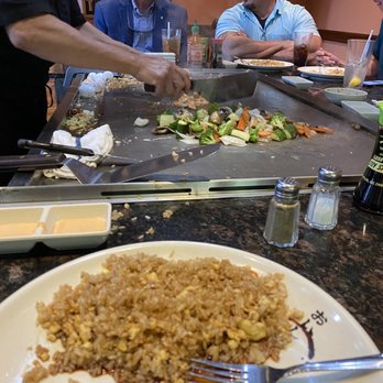 Misaki Hibachi and Sushi - a group of people sitting at a table with plates of food - Japanese Near Me - Covington, Louisiana Misaki Hibachi and Sushi - a group of people sitting at a table with plates of food - Japanese Near Me - Covington, Louisiana