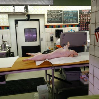 Lunardi's Markets - a butcher's table with a raw chicken on it - Grocery Near Me - Danville, California Lunardi's Markets - a butcher's table with a raw chicken on it - Grocery Near Me - Danville, California