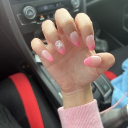 Gorgeous pink french nails with an amazing white star in the ring finger Gorgeous pink french nails with an amazing white star in the ring finger