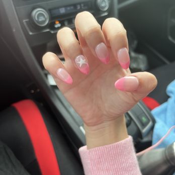 Candi Nails - Gorgeous pink french nails with an amazing white star in the ring finger - Nail Salons Near Me - Fullerton, California Candi Nails - Gorgeous pink french nails with an amazing white star in the ring finger - Nail Salons Near Me - Fullerton, California