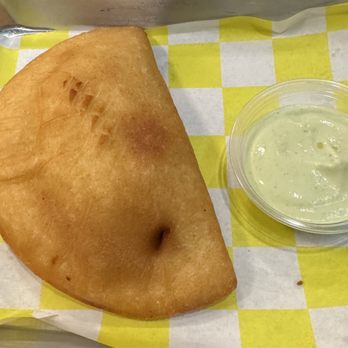 Milly's Empanada Factory - Chicken Empanada with sauce! - Venezuelan Near Me - Miami, Florida Milly's Empanada Factory - Chicken Empanada with sauce! - Venezuelan Near Me - Miami, Florida