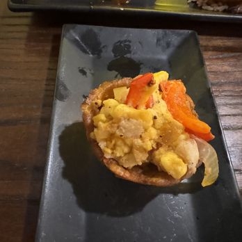 Reggae Jerk Hut - Fish appetizer in a plantain bowl. - Caribbean Near Me - McKinney, Texas Reggae Jerk Hut - Fish appetizer in a plantain bowl. - Caribbean Near Me - McKinney, Texas