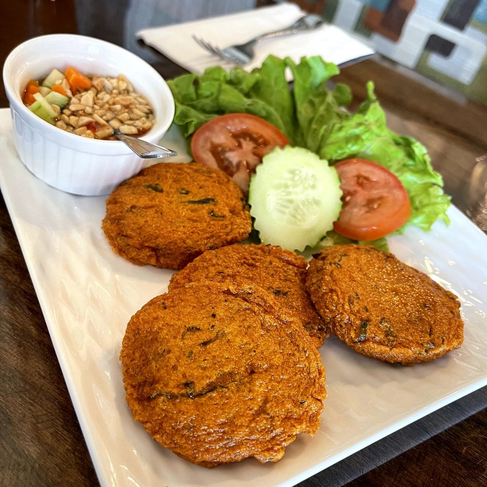 Eggplants Thai Cuisine - Fish cakes with cucumber and peanut plum sauce was flavorful and had a spicy kick to it - Thai Near Me - Temecula, California Eggplants Thai Cuisine - Fish cakes with cucumber and peanut plum sauce was flavorful and had a spicy kick to it - Thai Near Me - Temecula, California