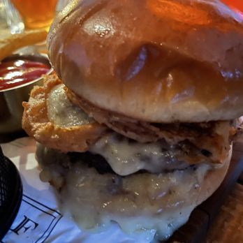 Wolf by Vanderpump at Caesars Republic Lake Tahoe - Wolf Signature Double smash burger, dill pickle, Wolf aioli, Havarti, meunster, crispy tobacco onions. - American Near Me - Stateline, Nevada Wolf by Vanderpump at Caesars Republic Lake Tahoe - Wolf Signature Double smash burger, dill pickle, Wolf aioli, Havarti, meunster, crispy tobacco onions. - American Near Me - Stateline, Nevada