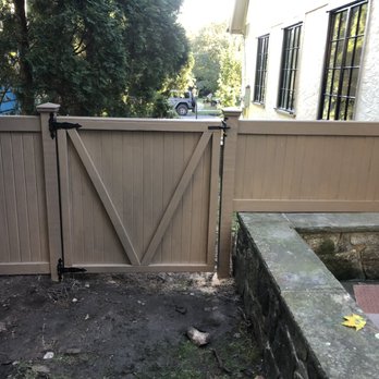 American Improvements - 4'h stained wood fence - General Contractors Near Me American Improvements - 4'h stained wood fence - General Contractors Near Me