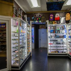 Owatonna Smoke Shop - Large Walk-in Humidor and Glass Pipe Selection