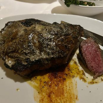 Eddie V's Prime Seafood - 18 oz USDA Prime Bone-In New York Strip with Smoked Chili Rub - Seafood Near Me - Plano, Texas Eddie V's Prime Seafood - 18 oz USDA Prime Bone-In New York Strip with Smoked Chili Rub - Seafood Near Me - Plano, Texas