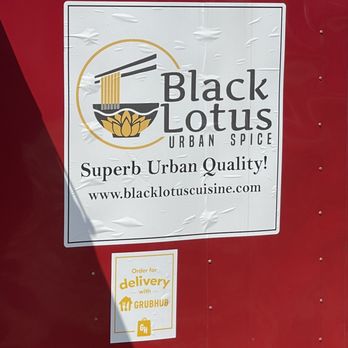 Black Lotus Cuisine - a sign on the side of a truck - Personal Chefs Near Me Black Lotus Cuisine - a sign on the side of a truck - Personal Chefs Near Me