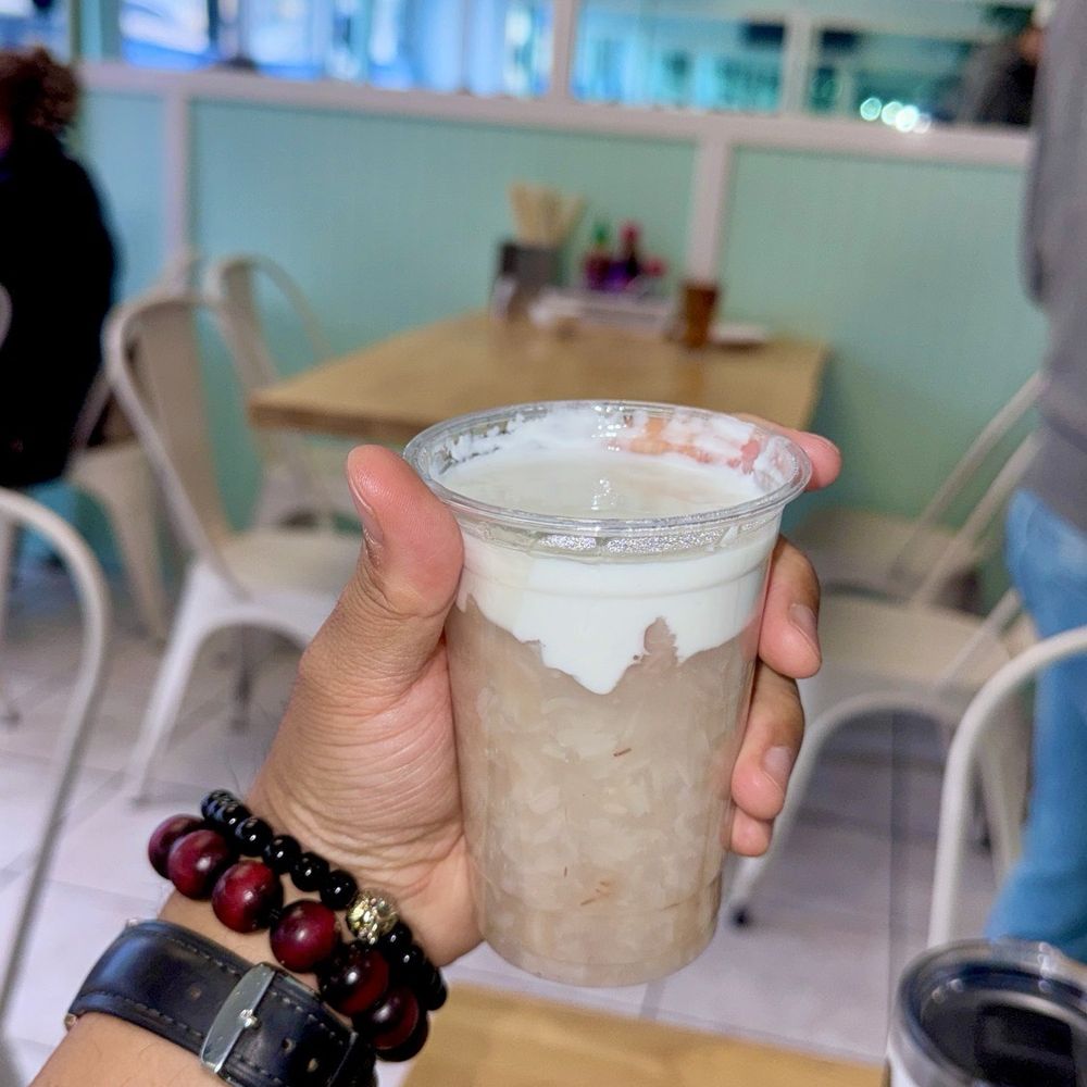 Mong Thu Cafe - Ig@BlackTigerEats holding taro and cream dessert - Vietnamese Near Me - San Francisco, California Mong Thu Cafe - Ig@BlackTigerEats holding taro and cream dessert - Vietnamese Near Me - San Francisco, California