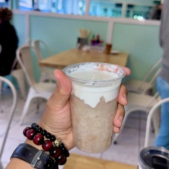 Mong Thu Cafe - Ig@BlackTigerEats holding taro and cream dessert - Vietnamese Near Me - San Francisco, California Mong Thu Cafe - Ig@BlackTigerEats holding taro and cream dessert - Vietnamese Near Me - San Francisco, California