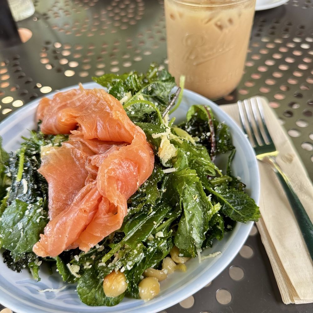 Lola's Cafe - Kale & Shaved Brussels Sprouts with salmon - Coffee & Tea Near Me - Ladera Ranch, California Lola's Cafe - Kale & Shaved Brussels Sprouts with salmon - Coffee & Tea Near Me - Ladera Ranch, California