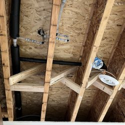 CMC General Contractor - Cross bridging, new drain pipe and water lines