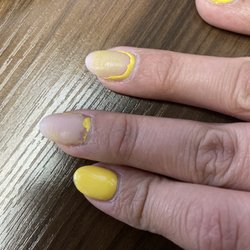 Organic Nails & Spa - Gel polish lifted and left sticky residue on my nail after it lifted.