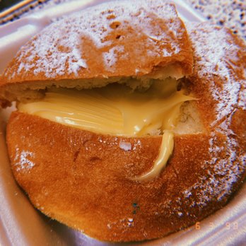 El Bolillo Bakery - Some Bavarian cream filled bread delight (no idea what this thing is called but it's good) - Bakeries Near Me - Houston, Texas