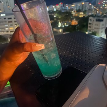 Eter - Lucid Dreams  Coconut Rum paired with Espirit Blue Curaçao, lemon, and a hint of Melon liqueur giving it a sweet and refreshing finish - Tapas/Small Plates Near Me - San Juan, Puerto Rico