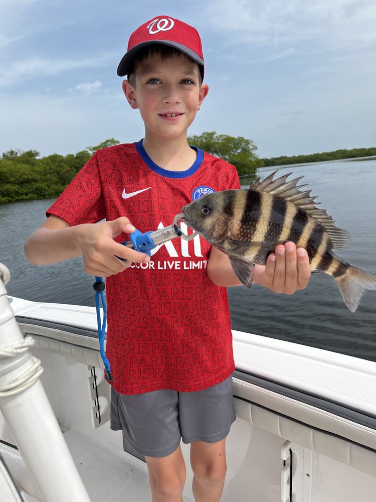 Reel Fishing SWFL Charters Logo