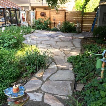 Scapes and Spaces - Ravenna-after construction of flagstone patio - Landscaping Near Me
