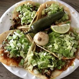 3 carne asada and 2 carnitas tacos - Really good!