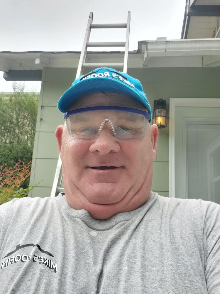 Slide of Mikes Roofing