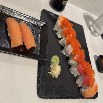 Umi Sushi - Smoke salmon nigiri and Rainbow roll with tobiko on top - Sushi Bars Near Me - Roseville, California Umi Sushi - Smoke salmon nigiri and Rainbow roll with tobiko on top - Sushi Bars Near Me - Roseville, California