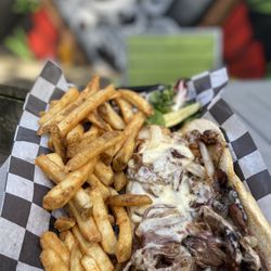 The Pour Farm Tavern - House-smoked Brisket Cheesesteak