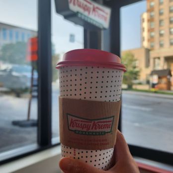 Krispy Kreme Cafe - a hand holding a cup of coffee - Donuts Near Me - Montreal, Quebec Krispy Kreme Cafe - a hand holding a cup of coffee - Donuts Near Me - Montreal, Quebec
