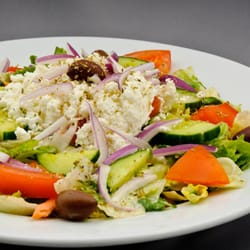 Santa Lucia Pizza - Greek salad with our house made dressing