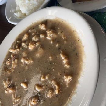 Bahamian Pot Restaurant - Stewed conch, grits, and Johnny cake - Caribbean Near Me - Miami, Florida