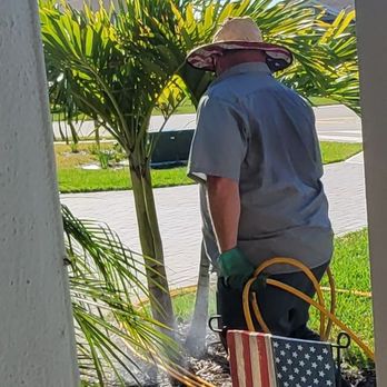 Paragon Pest Solutions - a man watering a tree - Pest Control Near Me - Melbourne, Florida Paragon Pest Solutions - a man watering a tree - Pest Control Near Me - Melbourne, Florida